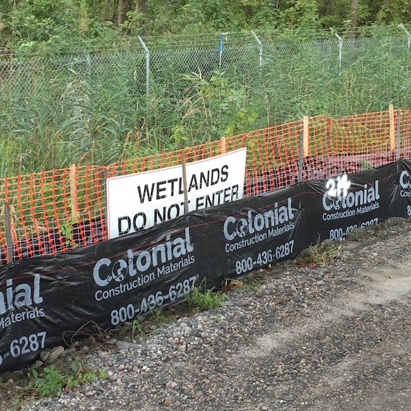 Logo Silt Fence is installed to control erosion on construction sites