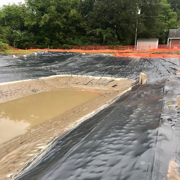 Liners are used in wet pond construction to separate soils