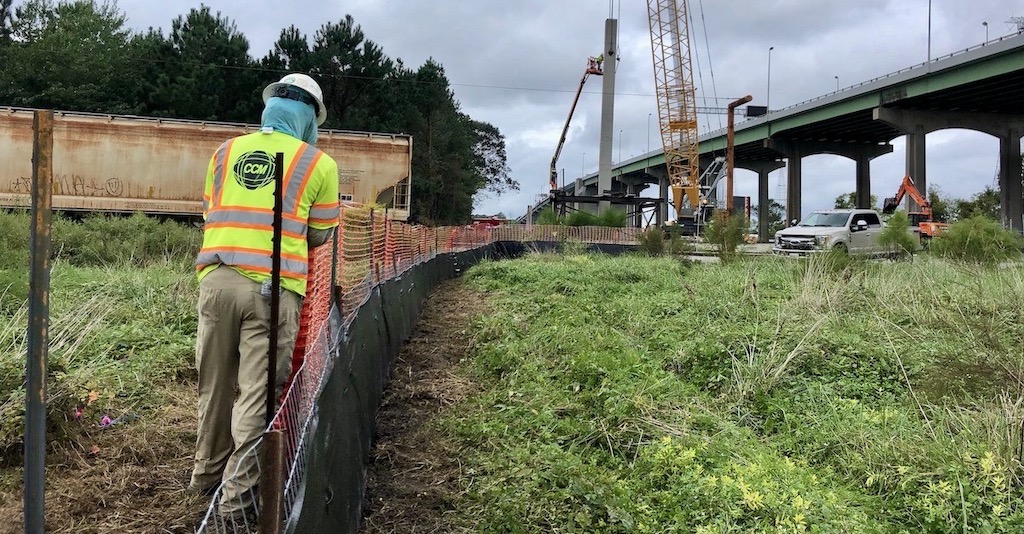 Installing wire reinforced silt fence