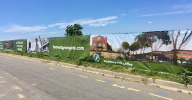 Custom fence screen wraps commercial mixed-use development