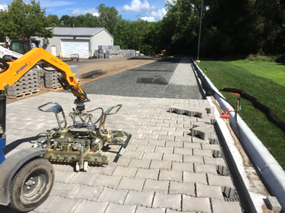 Equipment installs PaveDrain blocks