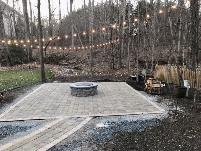 Completed backyard patio with fire pit