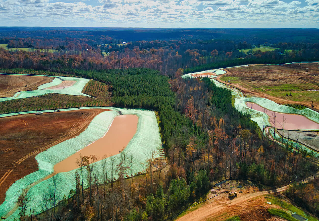 Recyclex permanent erosion blanket installed around ponds