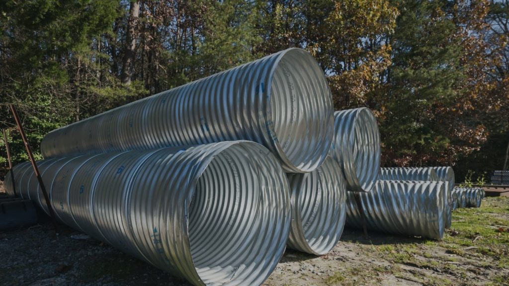 Corrugated metal pipe in Colonial Construction Materials stock yard