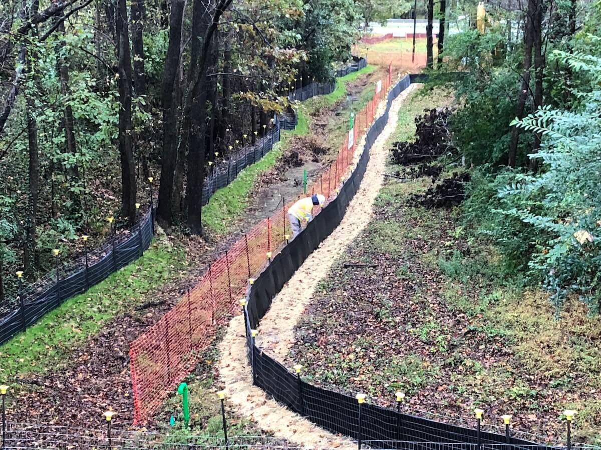 Wire reinforced silt fence and tree protection
