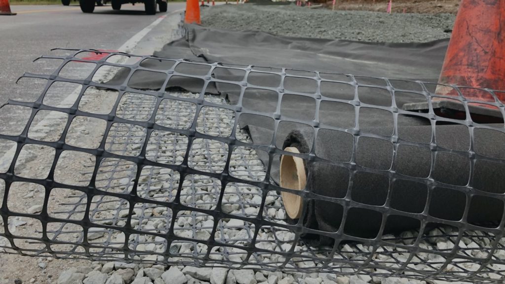 Geogrid and geotextile fabric