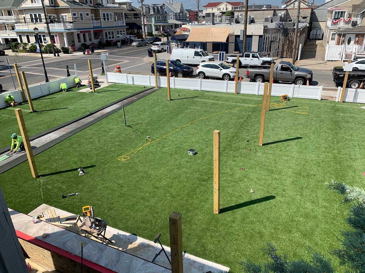 Installing artificial turf for a restaruant
