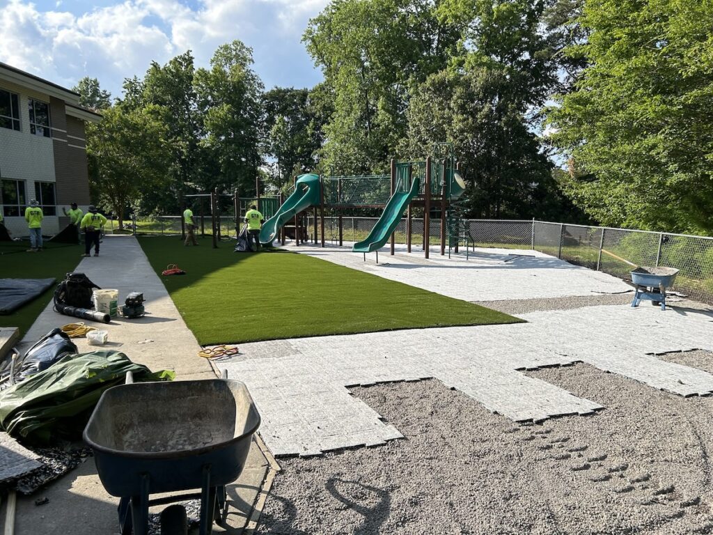 Installing artificial turf for playground