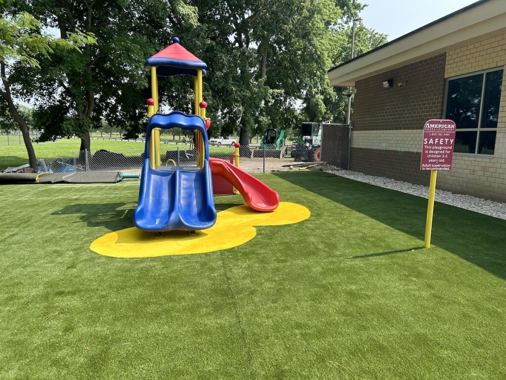 Artificial turf playground