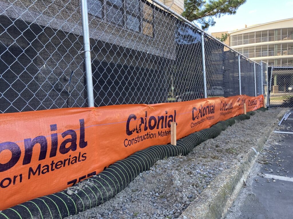 Silt sock reinforced logo silt fence at a retirement home in Virginia Beach